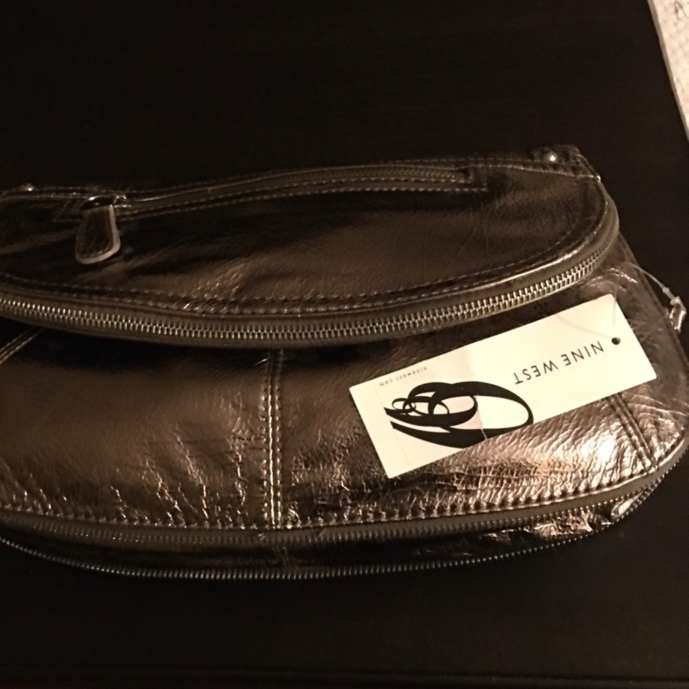 COPY - New Nine West Pale Bronze Zip clutch.